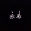 Aretes de plata flores quemadas