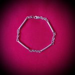Pulsera de plata tubos y argollas