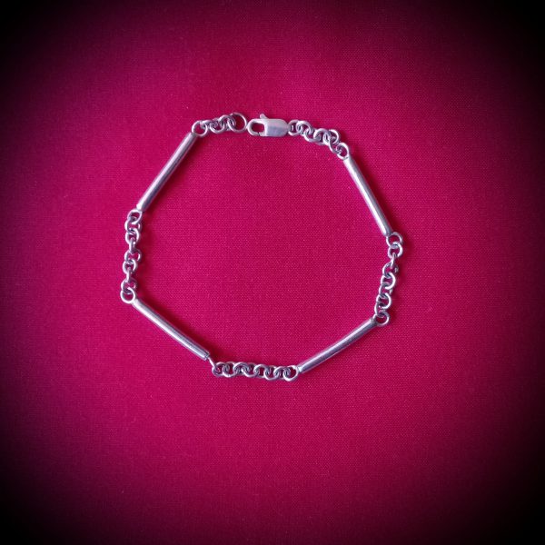 Pulsera de plata tubos y argollas