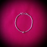 Pulsera de plata tubos y esfera de oro