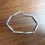 Pulsera de Plata tubos y argollas
